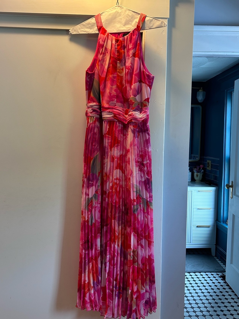 Floor length vibrant pink floral wedding guest dress